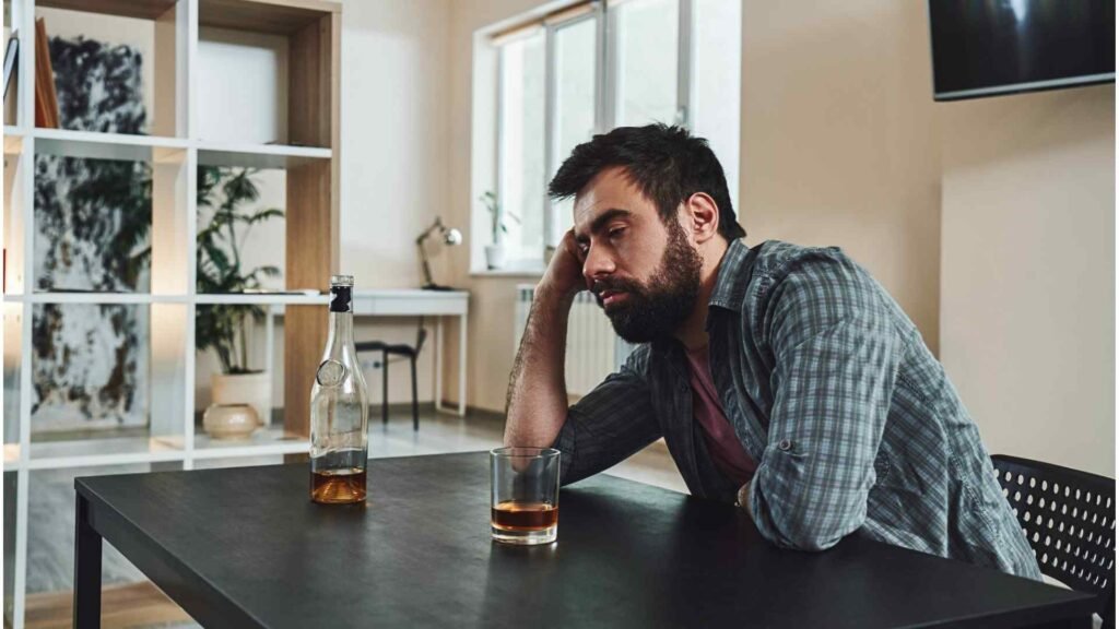 why does alcohol make you tired