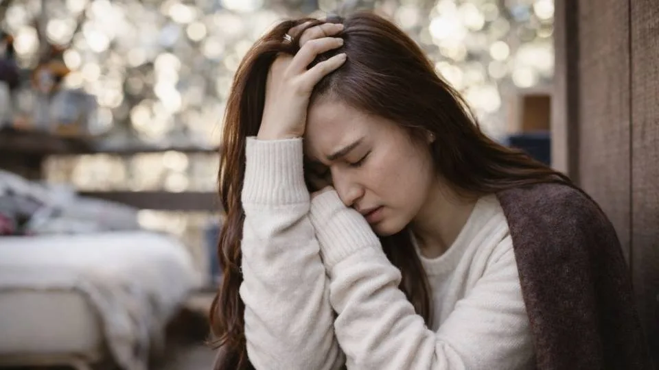 A woman suffers from 7 OH Withdrawal Symptoms.