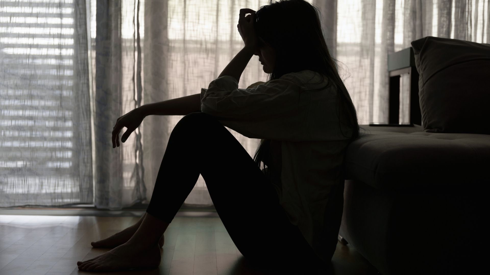 a woman struggling with codeine withdrawal symptoms