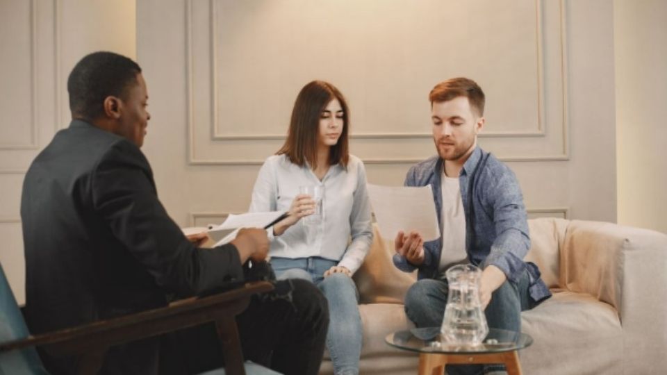 Family Reviewing Treatment Options with Clinician