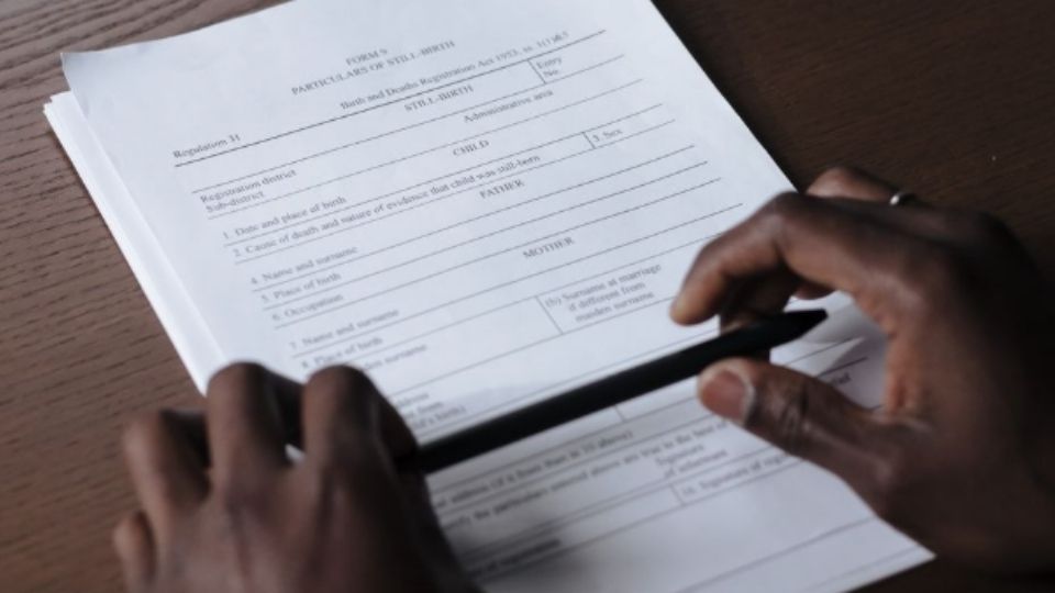 A family reviewing a written scope of work before hiring a drug and alcohol interventionist
